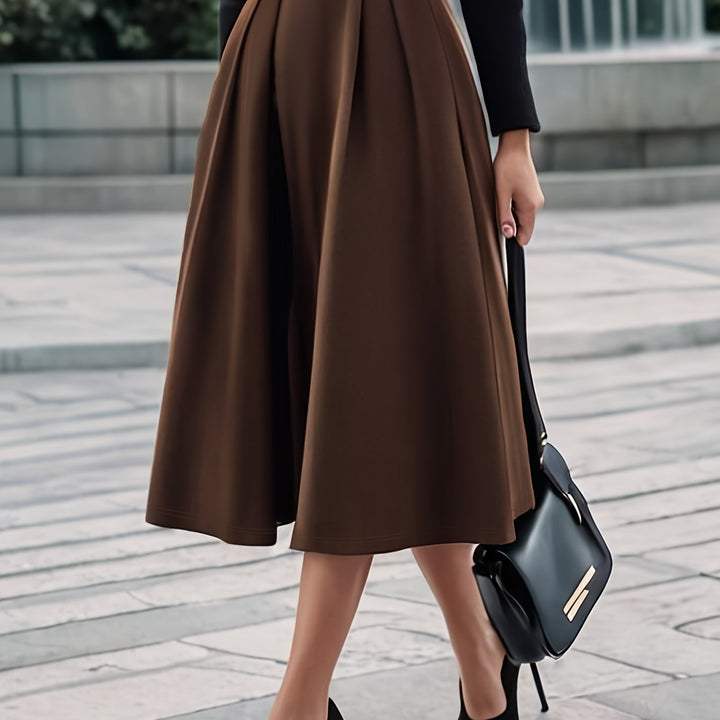 CELINE BLOOM | ELEGANT BELTED PENCIL SKIRT